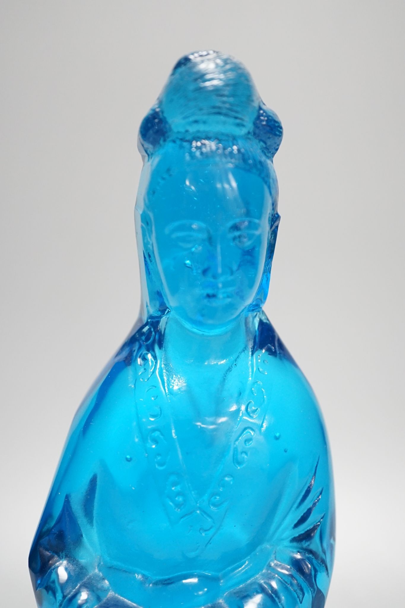 A Chinese blue glass figure of Guanyin 27cm